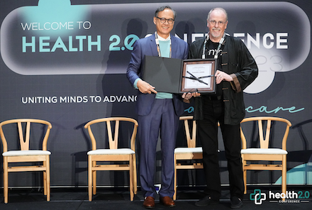 Mark Scrimshire accepting Health 2.0 Conference Leadership Award on behalf of Susheel Ladwa, CEO of Onyx